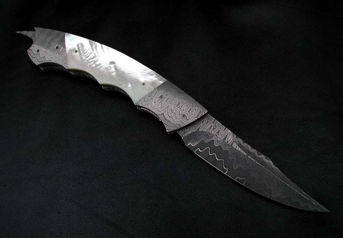 Custom handcrafted switchblades and stilettos